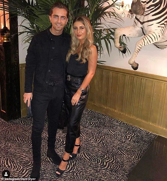 Loved-up: Weeks after their split, Dani was pictured snogging boyfriend Sammy Kimmence, who she dated prior to her relationship with Jack and reunited with after
