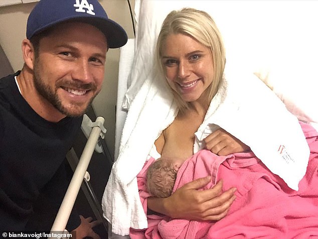 'We couldn't be more in love!' Neighbours star Scott McGregor has welcomed his second child with wife Bianka, son Jackson Charles McGregor (the trio are pictured)