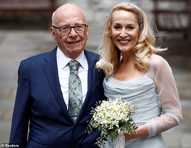 Rupert Murdoch and Jerry Hall outside St Bride's church in London following a service to celebrate their wedding in 2016 - they divorced in 2022